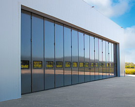 Өнөр жайлык жыгачтан жасалган, жылдыруучу жана ачылуучу дарбазалар